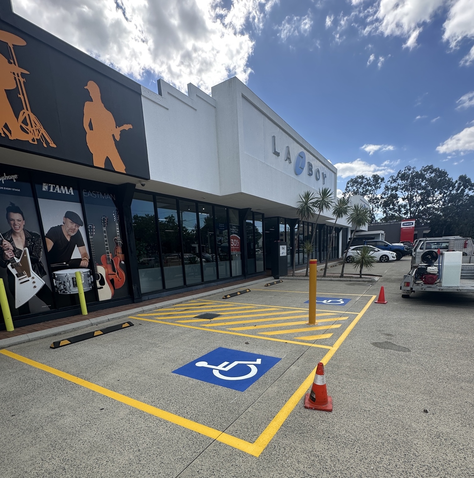 Disability bays with yellow hatching at retail centre