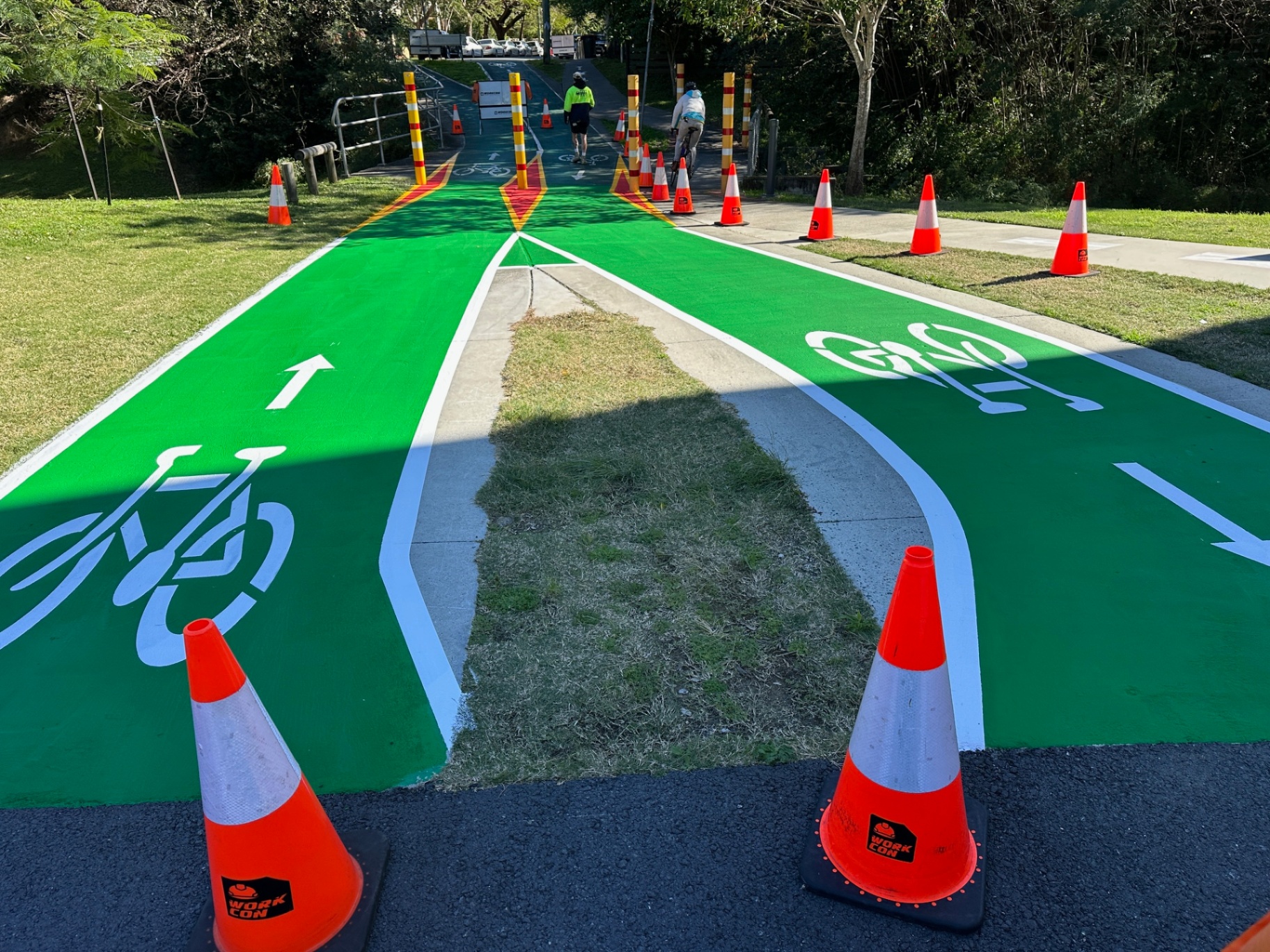 Green bike lane line marking on residential shared pathway