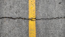 Crack on line yellow on road textured